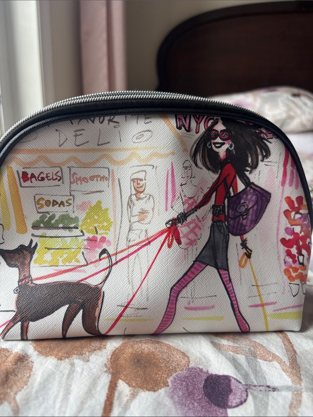 White Illustrated Cosmetic Bag with Pink and Purple Accents